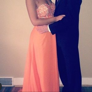 Orange prom dress with silver beading